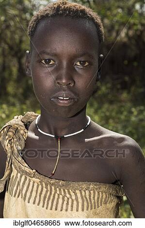 Stock Photography - Girl, portrait, tribe of the Mursi, Southern Nations Nationalities and Peoples' Region, Ethiopia, Africa. Fotosearch