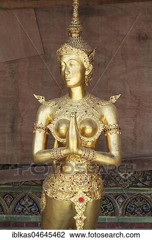 Gold plated female statue, mythical Buddhist figure, Wat Phra Kaeo, Ko Ratanakosin, Bangkok, Thailand, Asia View Large Photo Image Stock Image - Gold plated female statue, mythical Buddhist figure, Wat Phra Kaeo, Ko Ratanakosin, Bangkok, Thailand, Asia. Fotosearch