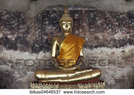 Golden Buddha statue in meditation posture, on decorated pedestal, Phra Rabieng Kot, Wat Suhtat, royal temple, Phra Nakhon, Bangkok, Thailand, Asia View Large Photo Image Stock Photo - Golden Buddha statue in meditation posture, on decorated pedestal, Phra Rabieng Kot, Wat Suhtat, royal temple, Phra Nakhon, Bangkok, Thailand, Asia. Fotosearch