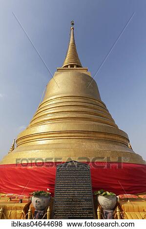 Golden Chedi with plaque, Phu Khao Thong, Golden Mountain, in Wat Saket, district Pom Prap Sattru Phai, Bangkok, Thailand, Asia View Large Photo Image Stock Photo - Golden Chedi with plaque, Phu Khao Thong, Golden Mountain, in Wat Saket, district Pom Prap Sattru Phai, Bangkok, Thailand, Asia. Fotosearch