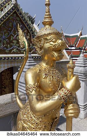 Picture - Golden statue of Singhapanorn, mythical Buddhist figure, Wat Phra Kaeo, Ko Ratanakosin, Bangkok, Thailand, Asia. Fotosearch