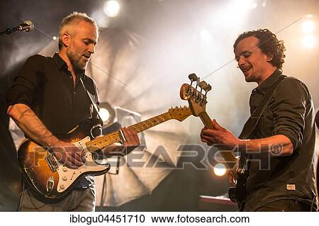 Gregi Heini, guitarist and Andi Schnellmann, bassist of the Swiss singer and songwriter Lukas Linder alias Henrik Belden with band at the record baptism live in the Schüür Lucerne, Switzerland, Europe View Large Photo Image Stock Image - Gregi Heini, guitarist and Andi Schnellmann, bassist of the Swiss singer and songwriter Lukas Linder alias Henrik Belden with band at the record baptism live in the Schüür Lucerne, Switzerland, Europe. Fotosearch