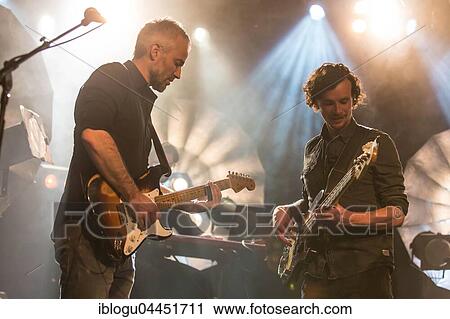 Gregi Heini, guitarist and Andi Schnellmann, bassist of the Swiss singer and songwriter Lukas Linder alias Henrik Belden with band at the record baptism live in the Schüür Lucerne, Switzerland, Europe View Large Photo Image Stock Image - Gregi Heini, guitarist and Andi Schnellmann, bassist of the Swiss singer and songwriter Lukas Linder alias Henrik Belden with band at the record baptism live in the Schüür Lucerne, Switzerland, Europe. Fotosearch
