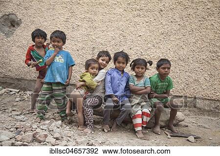Group of small children in the slum at the Ghazipur garbage dump, New Delhi, India, Asia View Large Photo Image Stock Image - Group of small children in the slum at the Ghazipur garbage dump, New Delhi, India, Asia. Fotosearch
