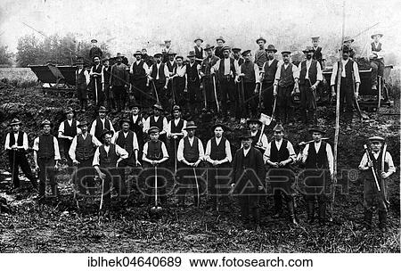 Group picture, construction workers with shovels, presumably road construction, 1920s, exact location unknown, Germany, Europe View Large Photo Image Stock Photo - Group picture, construction workers with shovels, presumably road construction, 1920s, exact location unknown, Germany, Europe. Fotosearch