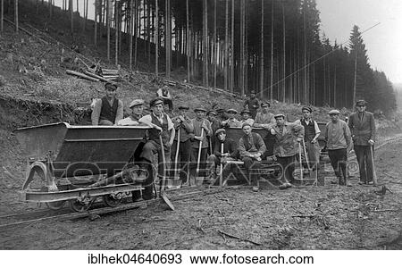 Stock Image - Group picture, workers in the forest, 1920s, exact location unknown, Germany, Europe. Fotosearch