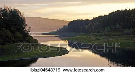 Stock Photo - Große Dhünntalsperre at sunset, drinking water reservoir, Bergisches Land, Wermelskirchen, North Rhine-Westphalia, Germany, Europe. Fotosearch