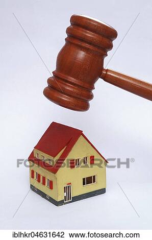 Hammer over a house, symbol picture for forced sale View Large Photo Image Stock Image - Hammer over a house, symbol picture for forced sale. Fotosearch