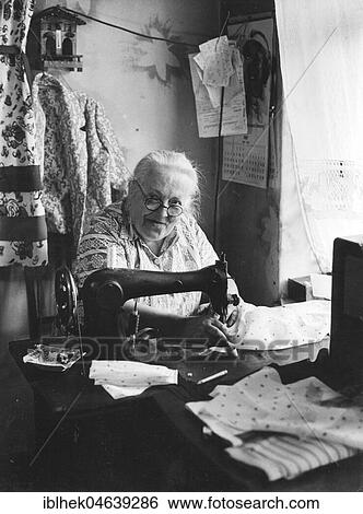 Handicraft, seamstress at sewing machine, 1950s, exact place unknown, Germany, Europe View Large Photo Image Stock Photograph - Handicraft, seamstress at sewing machine, 1950s, exact place unknown, Germany, Europe. Fotosearch