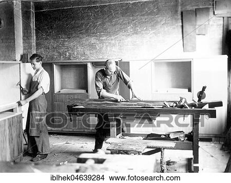 Picture - Handicraft, two carpenters working in a workshop, 1950s, exact location unknown, Germany, Europe. Fotosearch
