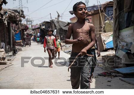 Happy children in the slum at the Ghazipur garbage dump, New Delhi, India, Asia View Large Photo Image Stock Image - Happy children in the slum at the Ghazipur garbage dump, New Delhi, India, Asia. Fotosearch
