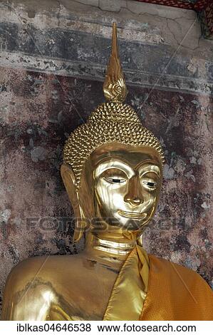 Head of a golden Buddha statue in meditation posture, on decorated pedestal, Phra Rabieng Kot, Wat Suhtat, royal temple, Phra Nakhon, Bangkok, Thailand, Asia View Large Photo Image Stock Photo - Head of a golden Buddha statue in meditation posture, on decorated pedestal, Phra Rabieng Kot, Wat Suhtat, royal temple, Phra Nakhon, Bangkok, Thailand, Asia. Fotosearch