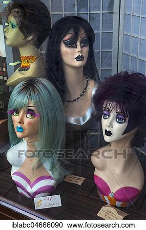 Stock Image - Heads of mannequins with wigs, Munich, Bavaria, Germany, Europe. Fotosearch