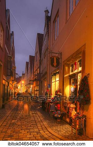 Houses and shops with Christmas lights at dusk, Schnoorviertel, Bremen, Germany, Europe View Large Photo Image Stock Photo - Houses and shops with Christmas lights at dusk, Schnoorviertel, Bremen, Germany, Europe. Fotosearch