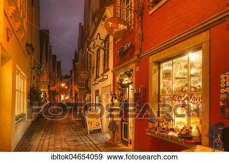 Stock Photo - Houses and shops with Christmas lights at dusk, Schnoorviertel, Bremen, Germany, Europe. Fotosearch