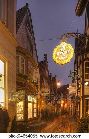 Houses and shops with Christmas lights at dusk, Schnoorviertel, Bremen, Germany, Europe View Large Photo Image Stock Photography - Houses and shops with Christmas lights at dusk, Schnoorviertel, Bremen, Germany, Europe. Fotosearch