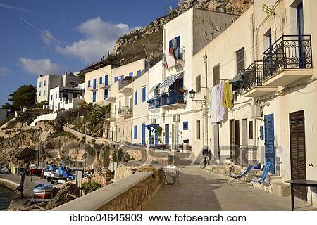 Stock Image - Houses at the port of Levanzo, Levanzo Island, Egadic Islands, Italy, Europe. Fotosearch