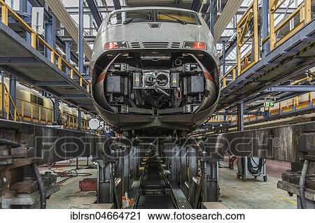 Stock Image - ICE 2 with open front flap during maintenance, ICE plant Berlin Rummelsburg, Berlin, Germany, Europe. Fotosearch