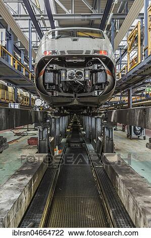 Stock Image - ICE 2 with open front flap during maintenance, ICE plant Berlin Rummelsburg, Berlin, Germany, Europe. Fotosearch