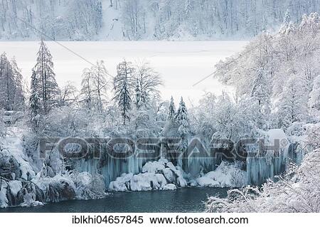 Stock Photography - Iced landscape, Frozen waterfall and frozen lake, Plitvice Lakes National Park, Plitvice, Croatia, Europe. Fotosearch