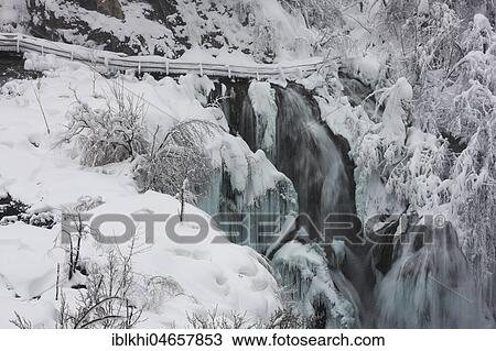 Stock Image - Iced landscape, Frozen waterfall, Plitvice Lakes National Park, Plitvice, Croatia, Europe. Fotosearch