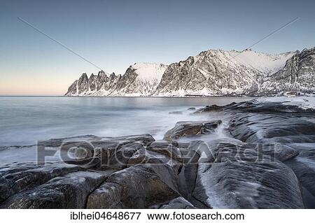 Icy coastal landscape on dusk, Tungeneset, Senja, Norway, Europe View Large Photo Image Stock Photo - Icy coastal landscape on dusk, Tungeneset, Senja, Norway, Europe. Fotosearch