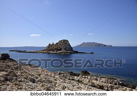Il Faraglione rocky island with Favignana Island in the back, Levanzo Island, Egadic Islands, Italy, Europe View Large Photo Image Stock Image - Il Faraglione rocky island with Favignana Island in the back, Levanzo Island, Egadic Islands, Italy, Europe. Fotosearch