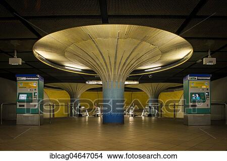 Picture - Illuminated column in entrance hall with ticket machine, subway station Opernplatz, Westend, Frankfurt am Main, Hesse, Germany, Europe. Fotosearch