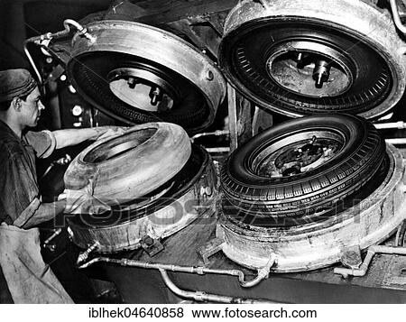 Stock Photo - Industry, car tires, production, fresh punched tires, 1950s, Germany, Europe. Fotosearch