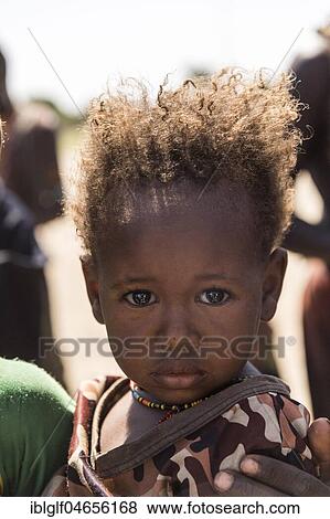 Stock Photo - Infant of the Arbore tribe, portrait, Turmi, Southern Nations Nationalities and Peoples' Region, Ethiopia, Africa. Fotosearch