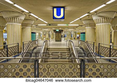Stock Photograph - Intermediate floor of the subway station Bockenheimer Warte with escalator to the platforms, Bockenheim, Frankfurt am Main, Hesse, Germany, Europe. Fotosearch