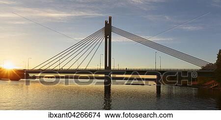 Jatkankynttilasilta, Holzfallerkerzenbrucke, Brucke uber den Kemijoki bei Mitternachtssonne, Rovaniemi, Nahe Polarkreis, Lappland, Finnland, Europa View Large Photo Image Picture - Jatkankynttilasilta, Holzfallerkerzenbrucke, Brucke uber den Kemijoki bei Mitternachtssonne, Rovaniemi, Nahe Polarkreis, Lappland, Finnland, Europa. Fotosearch