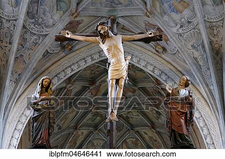 Stock Image - Jesus on the cross inside Romanesque abbey church of St. Lambert, Benedictine monastery Seeon, Seebruck, Chiemgau, Upper Bavaria, Bavaria, Germany, Europe. Fotosearch