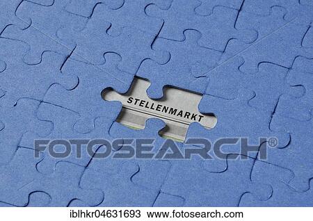 Stock Image - Jigsaw puzzle with missing piece, job market, symbol picture for career, job seeking, unemployment. Fotosearch