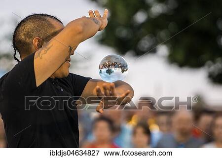 Juggler with crystal ball, Kulturufer, Festival with street artists, Friedrichshafen, Lake Constance, Baden-Württemberg, Germany, Europe View Large Photo Image Stock Photo - Juggler with crystal ball, Kulturufer, Festival with street artists, Friedrichshafen, Lake Constance, Baden-Württemberg, Germany, Europe. Fotosearch
