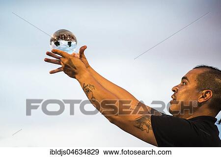 Juggler with crystal ball, Kulturufer, Festival with street artists, Friedrichshafen, Lake Constance, Baden-Württemberg, Germany, Europe View Large Photo Image Stock Photo - Juggler with crystal ball, Kulturufer, Festival with street artists, Friedrichshafen, Lake Constance, Baden-Württemberg, Germany, Europe. Fotosearch