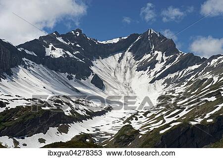 Stock Image - Kar mit Schnee unterhalb der Gipfel Mont Sagerou und Dent de Barme, Vallon de Susanfe, Champery, Wallis, Schweiz, Europa. Fotosearch