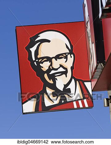 Stock Image - KFC Kentucky Fried Chicken logo sign on one of it's fast food restaurants, Serbia, Europe. Fotosearch