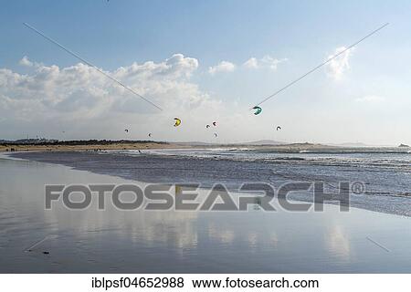 Stock Photo - Kitesurfer on the beach, Essaouira, Morocco, Africa. Fotosearch