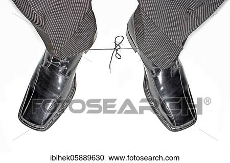 Stock Image - Knot in the shoelaces, Berlin, Germany, Europe. Fotosearch