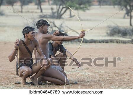 Kung Bushmen with bow and arrow, Zebra Lodge, Hardap Region, Namibia, Africa View Large Photo Image Stock Photo - Kung Bushmen with bow and arrow, Zebra Lodge, Hardap Region, Namibia, Africa. Fotosearch