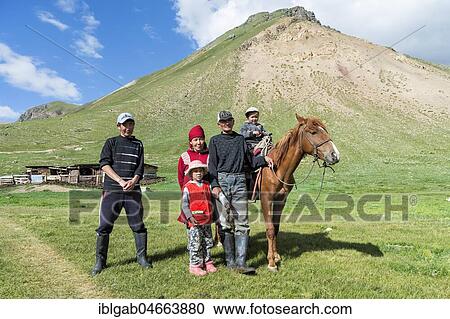 Kyrgyz family with horse, Sary Jaz valley, Issyk Kul region, Kyrgyzstan, Asia View Large Photo Image Stock Image - Kyrgyz family with horse, Sary Jaz valley, Issyk Kul region, Kyrgyzstan, Asia. Fotosearch