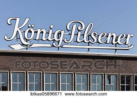 Stock Image - König-Pilsener, lettering at Duisburg central station, North Rhine-Westphalia, Germany, Europe. Fotosearch