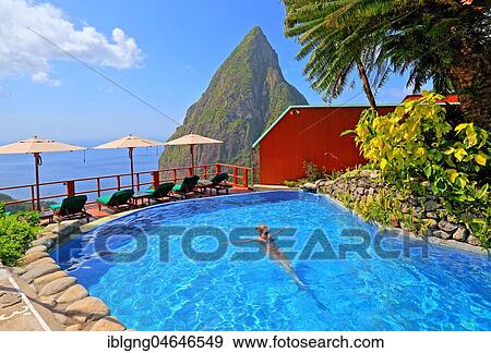 Stock Photo - Ladera Resort swimming pool with the Petit Piton 743m, Soufriere, St. Lucia, Lesser Antilles, West Indies, Caribbean Islands. Fotosearch