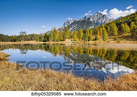 Stock Photography - Lai Nair with Piz Lischana, 3105m and Piz San Jon Dadora, 3048m, Graubuenden, Switzerland, Europe. Fotosearch