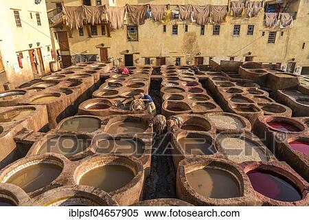 Stock Photography - Leather dyeing tanks, dyeing plant, Tannerie Chouara tannery, Fes el Bali tannery and dyeing district, Fez, Morocco, Africa. Fotosearch