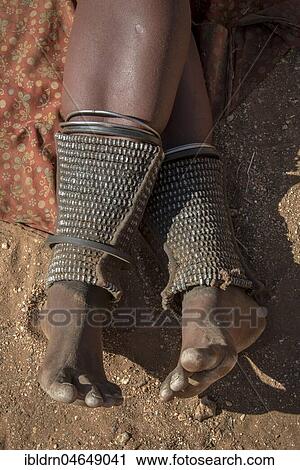 Leg ornamentation and at the same time protection against snake bites in the people of Ovahimba or Himba, Kunene district, Namibia, Africa View Large Photo Image Stock Image - Leg ornamentation and at the same time protection against snake bites in the people of Ovahimba or Himba, Kunene district, Namibia, Africa. Fotosearch