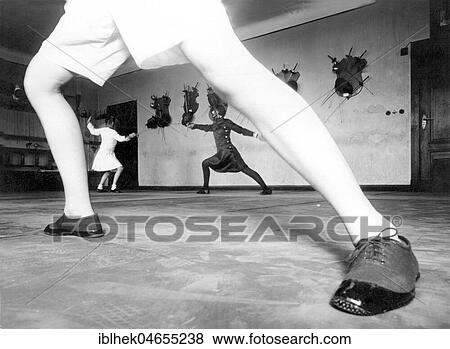 Legs of a fencer, sports, fencing, 1930s, exact place unknown, Germany, Europe View Large Photo Image Stock Photo - Legs of a fencer, sports, fencing, 1930s, exact place unknown, Germany, Europe. Fotosearch