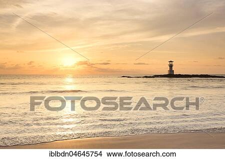 Picture - Lighthouse on Khao Lak beach at sunset, Khao Lak National Park, Thailand, Asia. Fotosearch