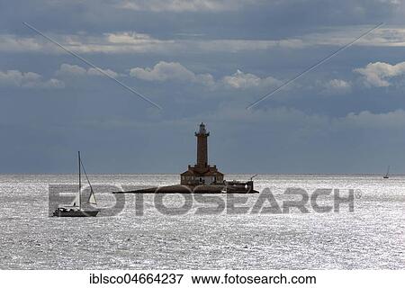 Lighthouse with sailboat, Cape Kamenjak, Istria, Croatia, Europe View Large Photo Image Stock Photo - Lighthouse with sailboat, Cape Kamenjak, Istria, Croatia, Europe. Fotosearch